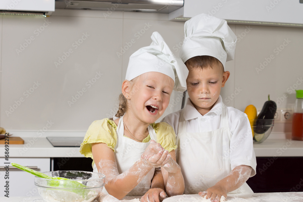 Little Chefs Baking Something in Kitchen Little Chefs Baking Something in Kitchen