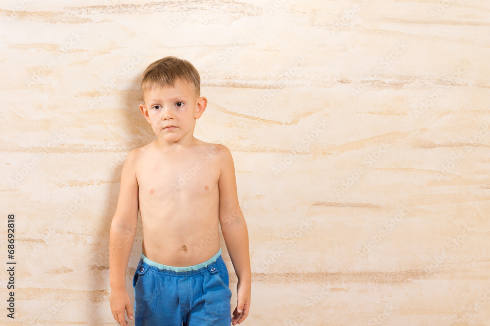 White Little Kid in Blue Shorts