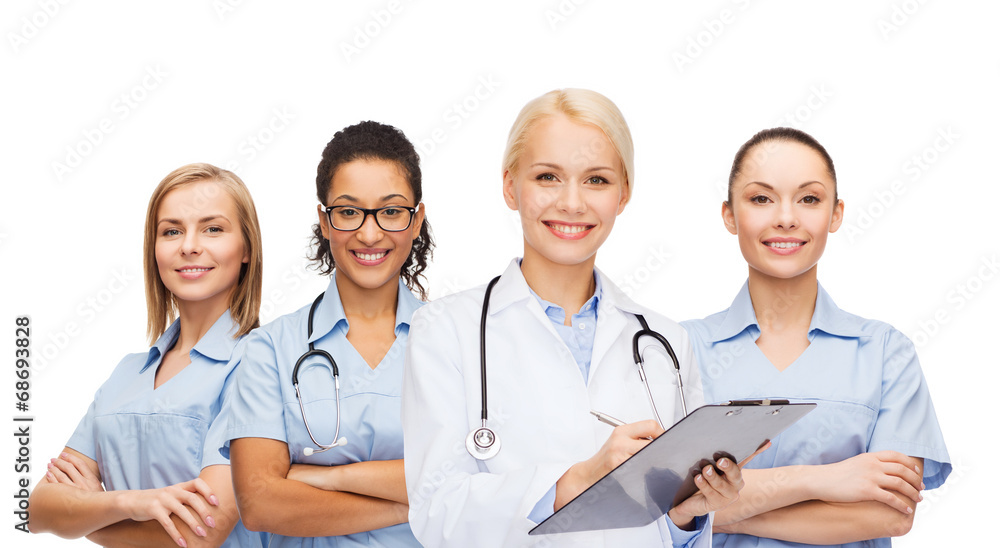 smiling female doctor and nurses with stethoscope smiling female doctor and nurses with stethoscope