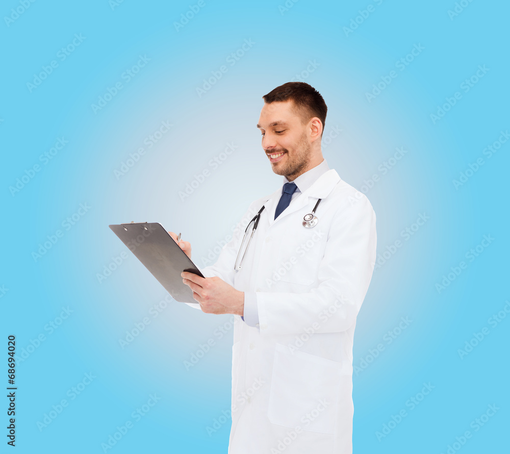 smiling male doctor with clipboard and stethoscope smiling male doctor with clipboard and stethoscope