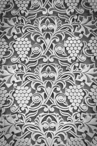 Ornament from grapes, grape leaves on wall of church
