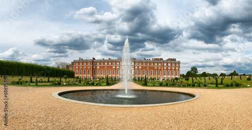 Hampton Court Palace and fountain at Privy Gardens photo