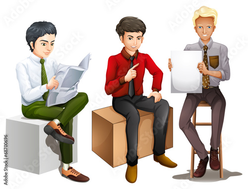 Three men sitting down while reading, talking and holding an emp