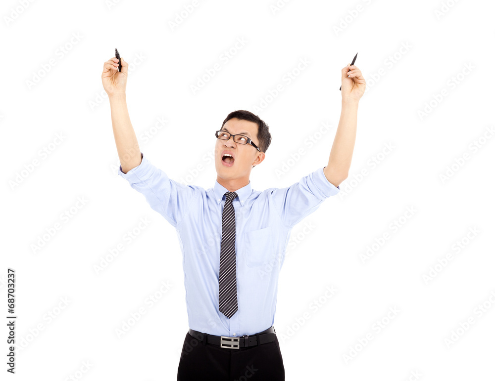 busy businessman holding pens to work . isolated on white busy businessman holding pens to work . isolated on white