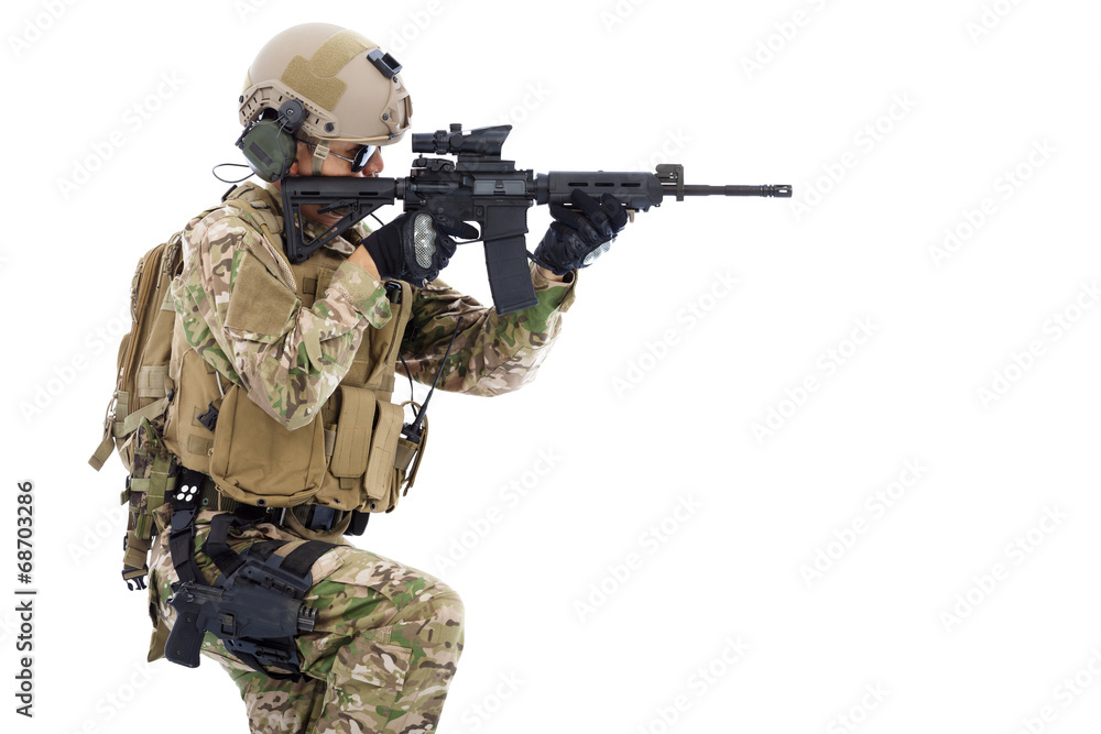 Fototapeta premium Soldier holding rifle or sniper and ready to shot