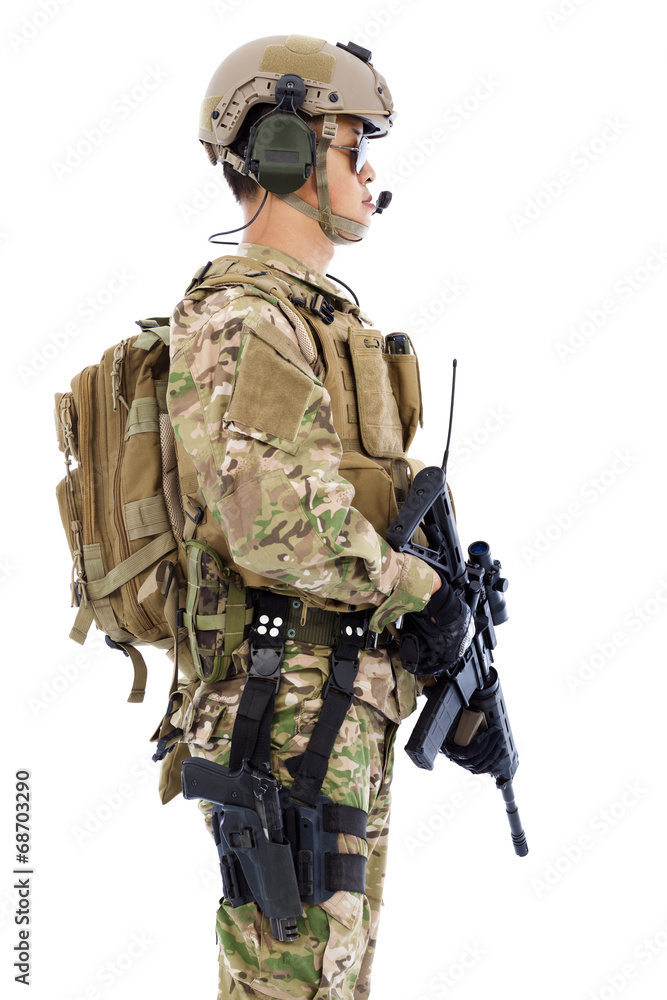Soldier with rifle or sniper standing on a white background Soldier with rifle or sniper standing on a white background