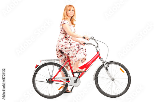Mature woman riding a bike
