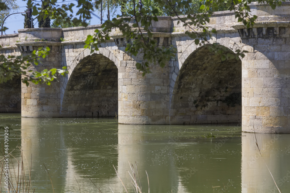 famous stone bridge, Puente Mayor, XVI Century, in Palencia, Spa
