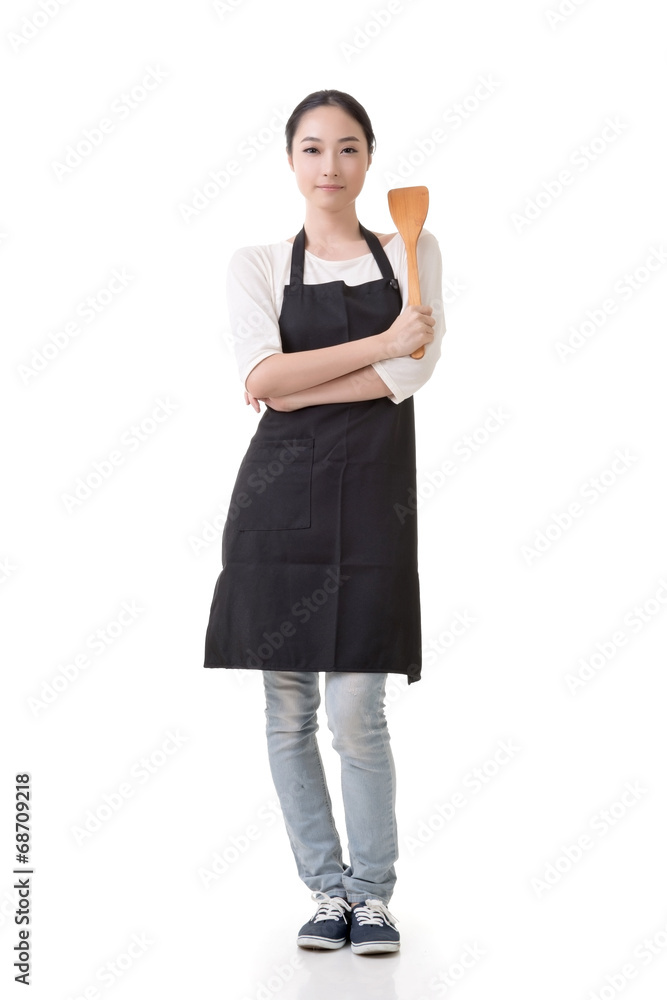 housewife hold a spatula housewife hold a spatula