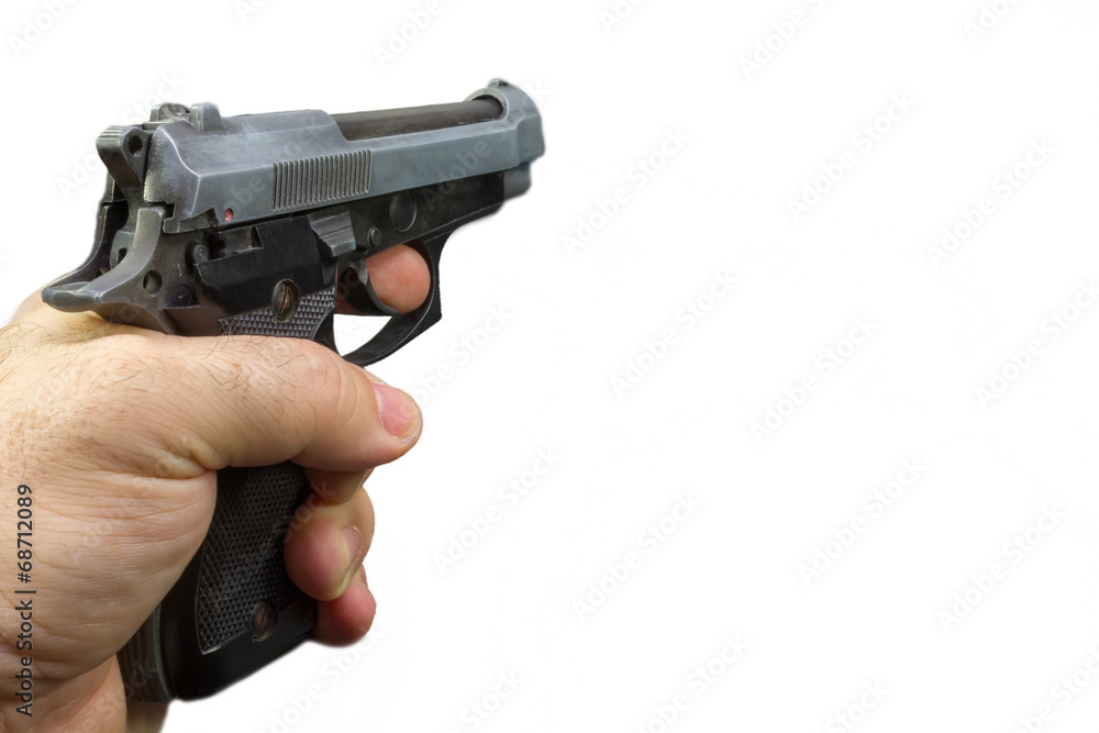 semiautomatic pistol in a hand with white background semiautomatic pistol in a hand with white background