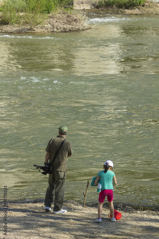 TOLEDO,SPAIN - APRIL 20:day of family fishing in the river Tajo TOLEDO,SPAIN - APRIL 20:day of family fishing in the river Tajo