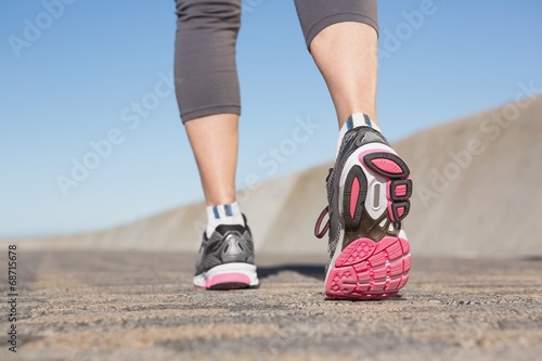 Active senior woman jogging on the pier © WavebreakMediaMicro