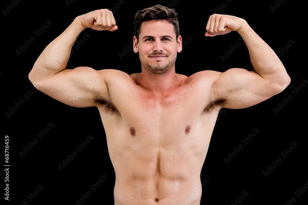 Portrait of shirtless muscular man flexing muscles Portrait of shirtless muscular man flexing muscles