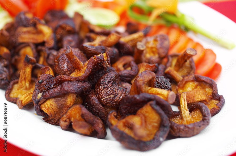 close up chinese food from mushroom fried in white dish close up chinese food from mushroom fried in white dish