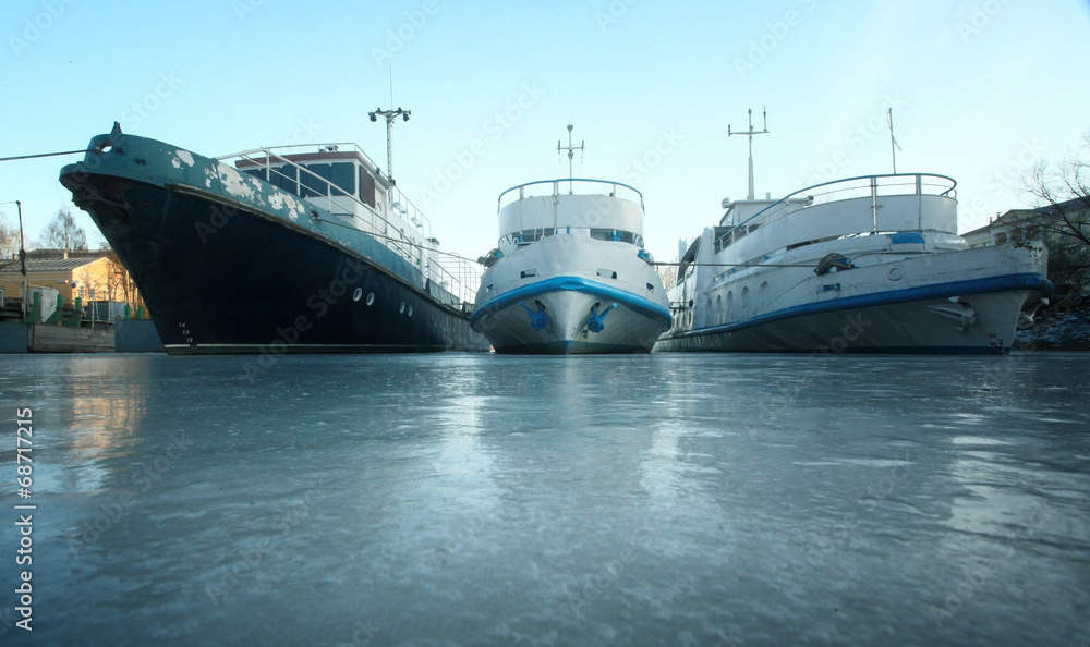 ships on the frozen river, boat parking ships on the frozen river, boat parking