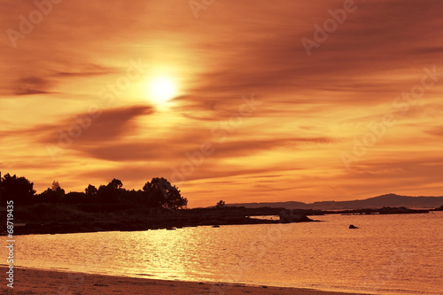 Red sunset on Espineiro beach