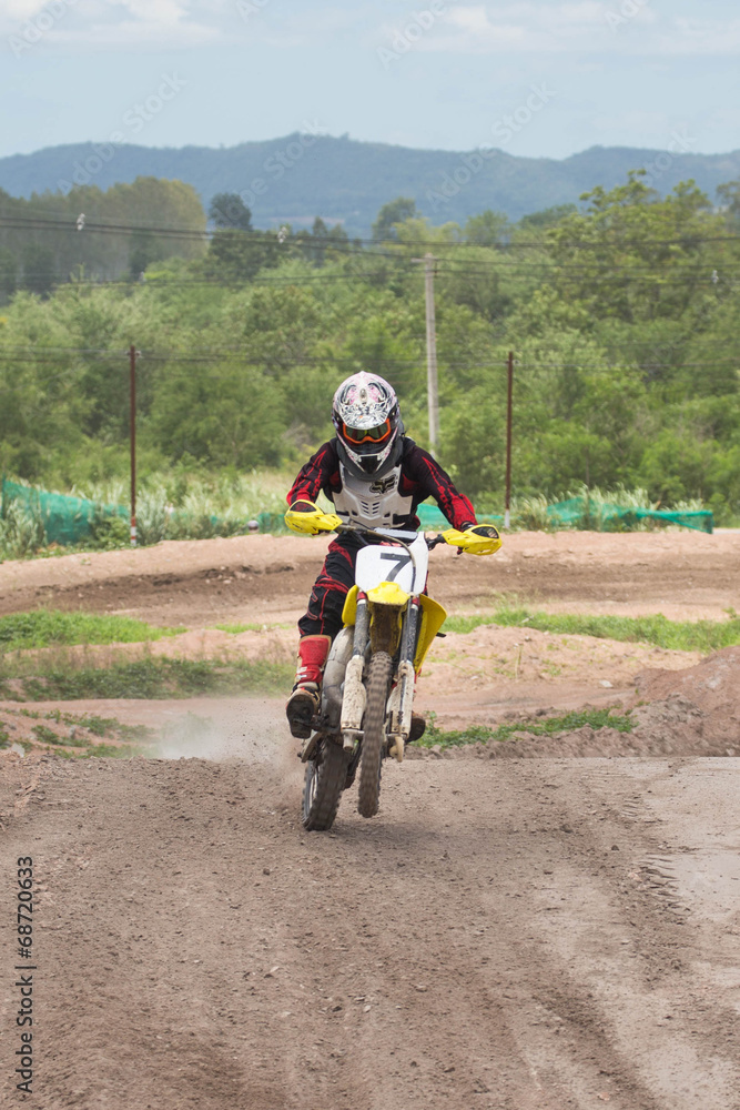 A picture of a biker making a stunt and jumps in the air A picture of a biker making a stunt and jumps in the air