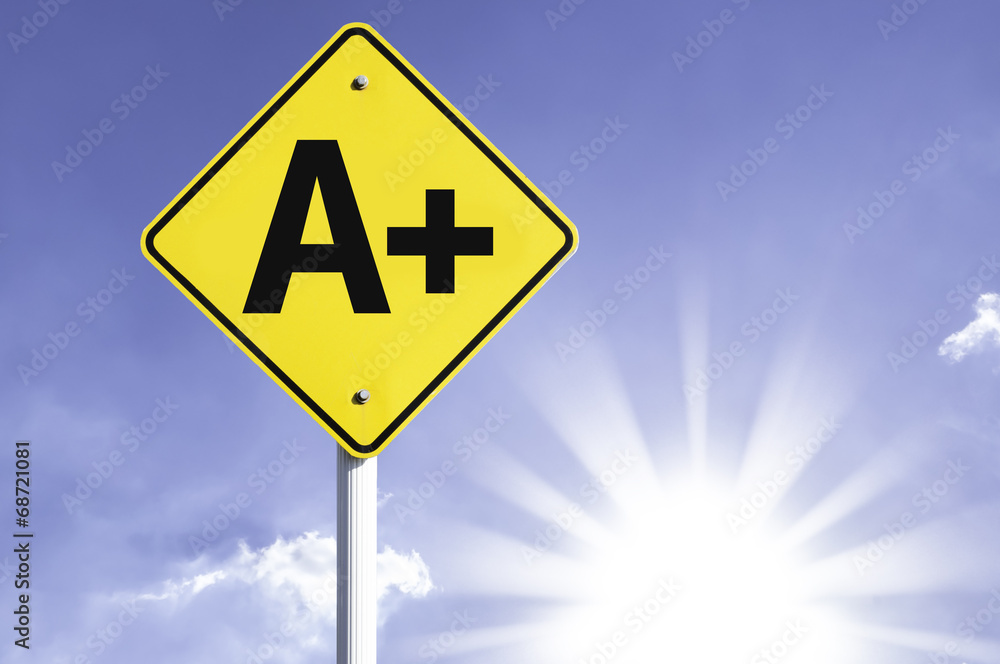 A + road sign with sun background A + road sign with sun background
