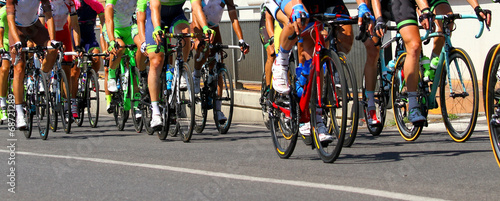 legs of cyclists who ride during the race