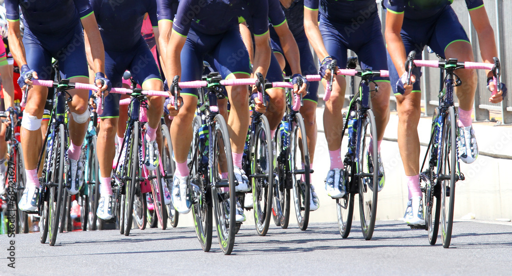 Fototapeta premium team of cyclists with the blue Jersey in cycling race