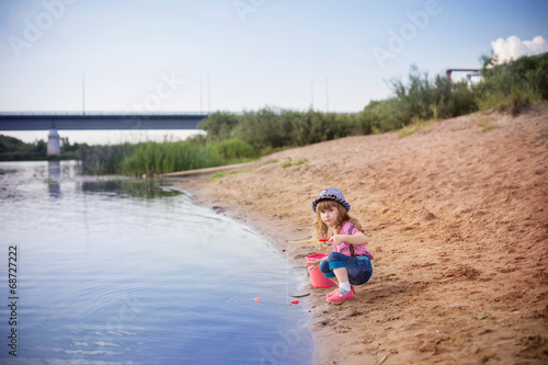 child playing in fishing