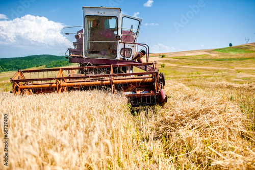 industrial harvesting combine harvesting wheat