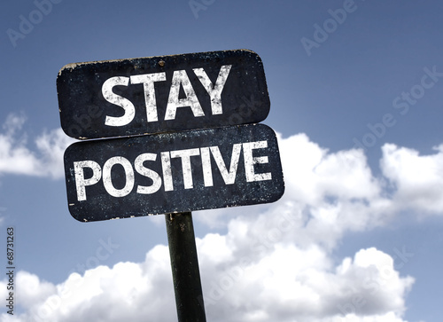 Fotografie, Obraz Stay Positive sign with clouds and sky background