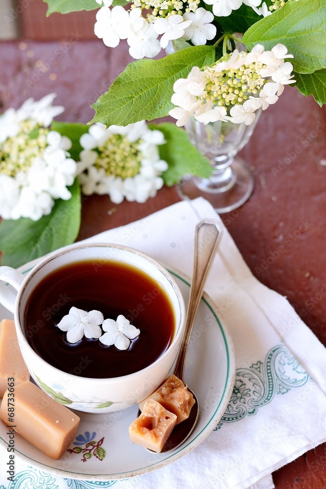 Cup of tea and flowers Cup of tea and flowers