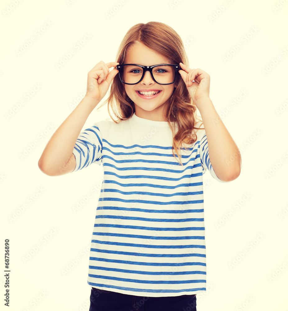 smiling cute little girl with black eyeglasses smiling cute little girl with black eyeglasses