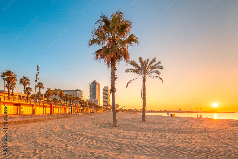 Barceloneta Beach in Barcelona at sunrise - obrazy, fototapety, plakaty 