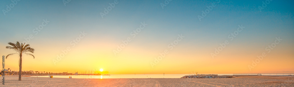 Barceloneta Beach in Barcelona at sunrise Barceloneta Beach in Barcelona at sunrise