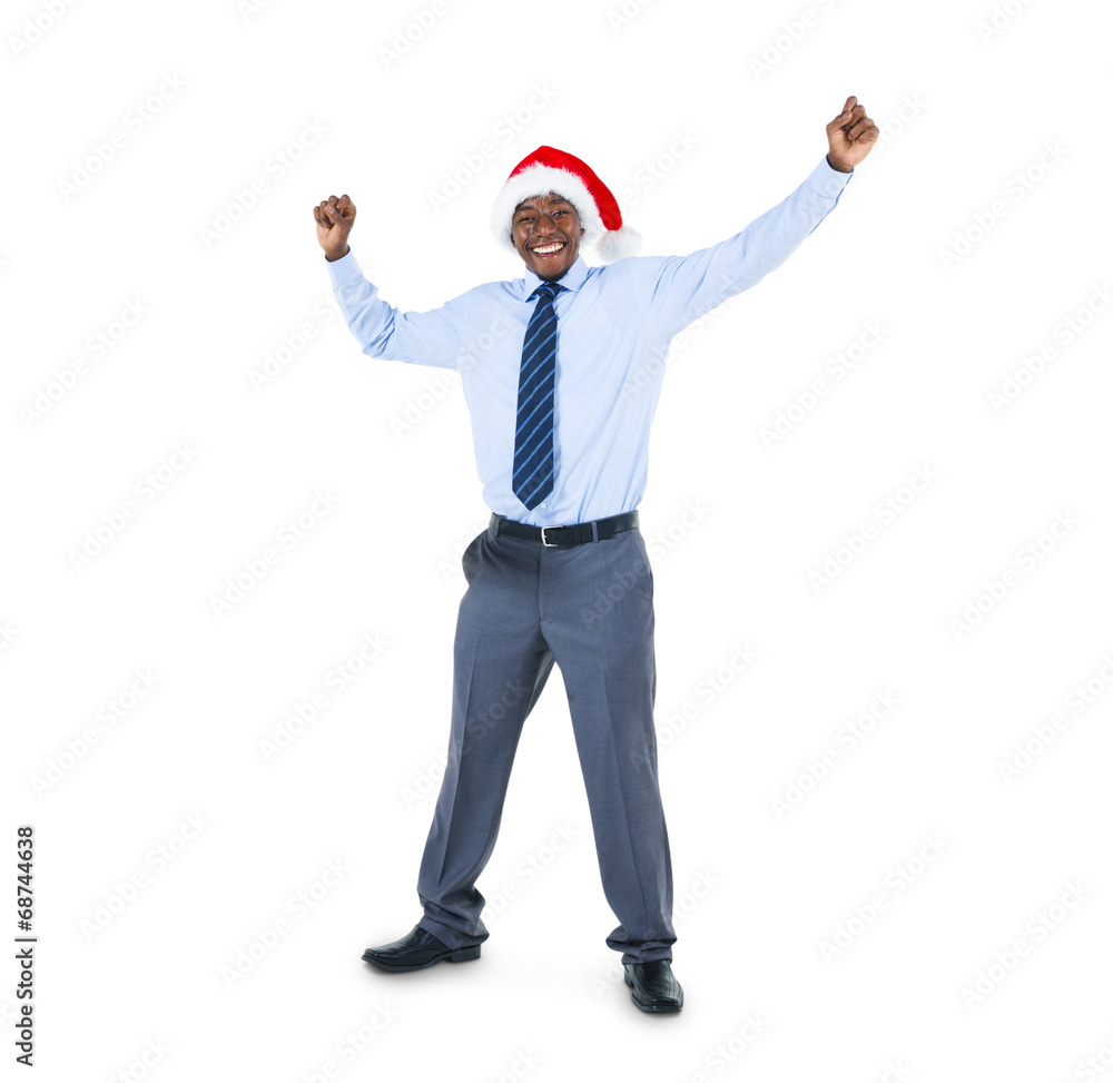African Businessman in a Santa Hat Celebrating African Businessman in a Santa Hat Celebrating