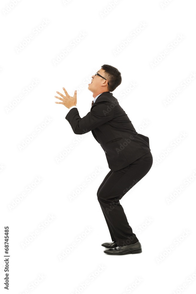 young business man standing a funny pose with white background Stock Photo