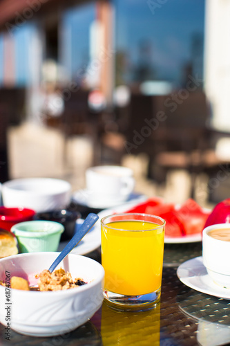 Cacao  juice  muesli and fruits for breakfast at a cafe in the