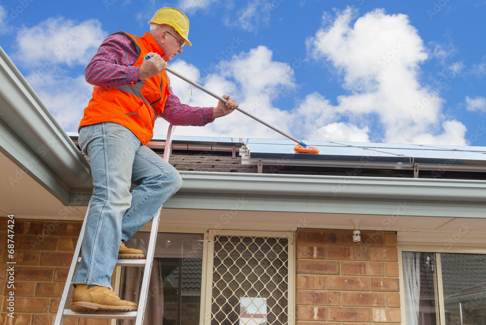 worker and solar panels worker and solar panels
