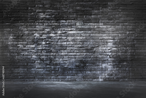 Black Brick Wall and Cement Floor