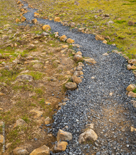 Road in Icelandic mountains photo