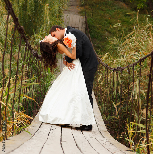 young wedding couple, beautiful bride with goom portrait on the photo