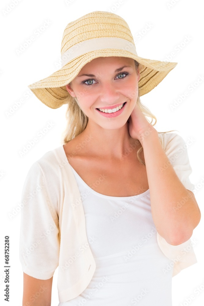 Attractive young blonde smiling at camera in sunhat Attractive young blonde smiling at camera in sunhat