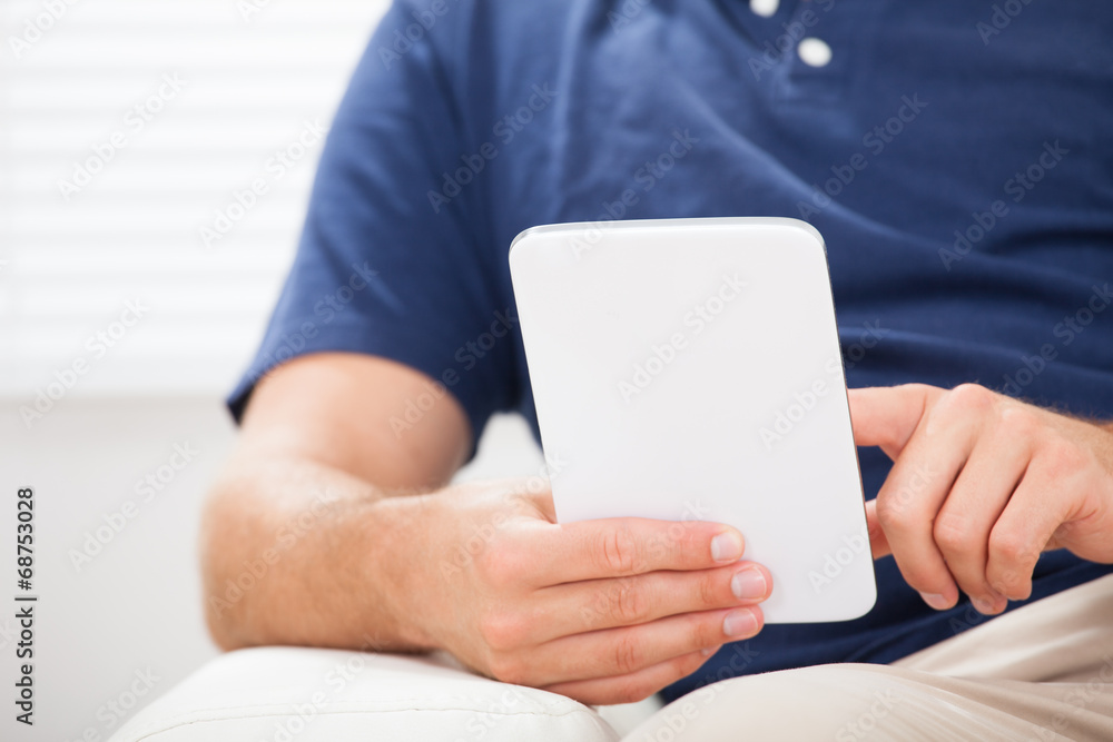 Man Using Smartphone At Home