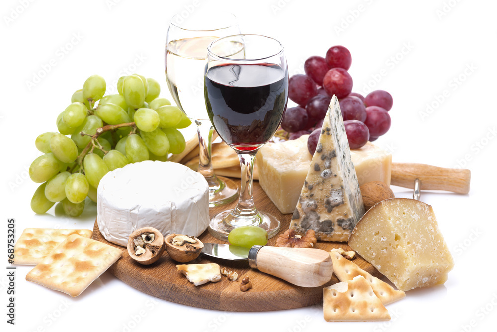 two glasses of wine, grapes, cheese and crackers