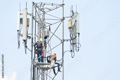 Technician working on communication towers