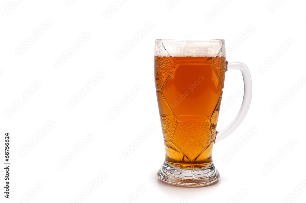 A glass with beer isolated on the background A glass with beer isolated on the background