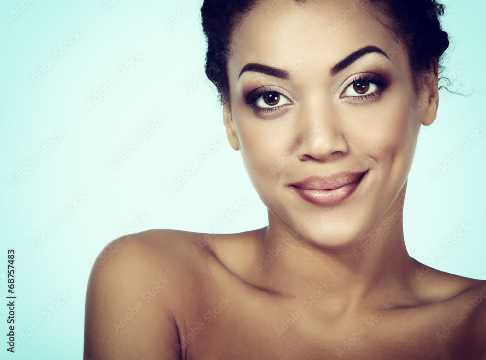 Fototapeta premium Young fresh woman with beautiful makeup looking at camer