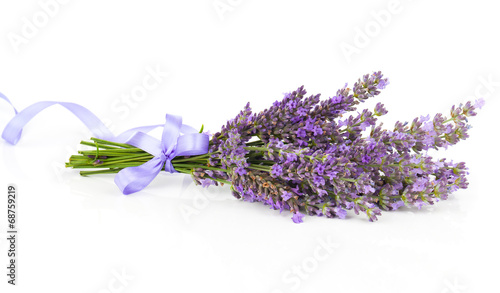 Fototapeta Naklejka Na Ścianę i Meble -  Bunch of lavender flowers with satin ribbon, on a white backgrou
