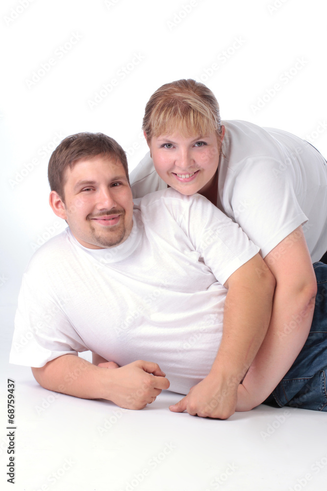 portrait of an ordinary couple over white background portrait of an ordinary couple over white background