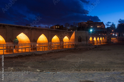 Night view of Chubi bridge in Esfahan, Iran photo