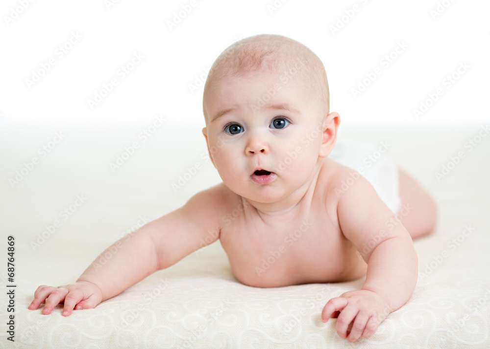 Cute baby isolated lying on blanket Cute baby isolated lying on blanket
