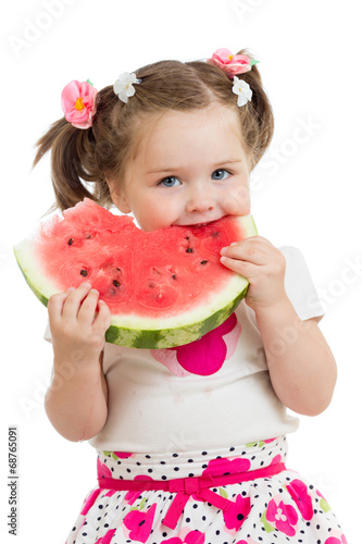 Kid girl eating watermelon ...