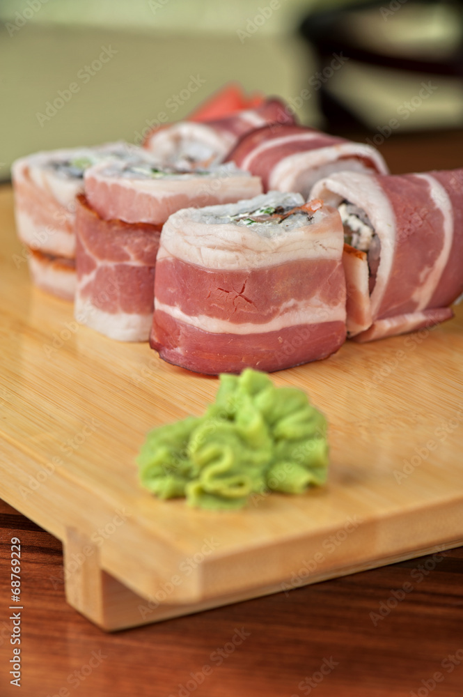 Sushi roll with bacon Sushi roll with bacon